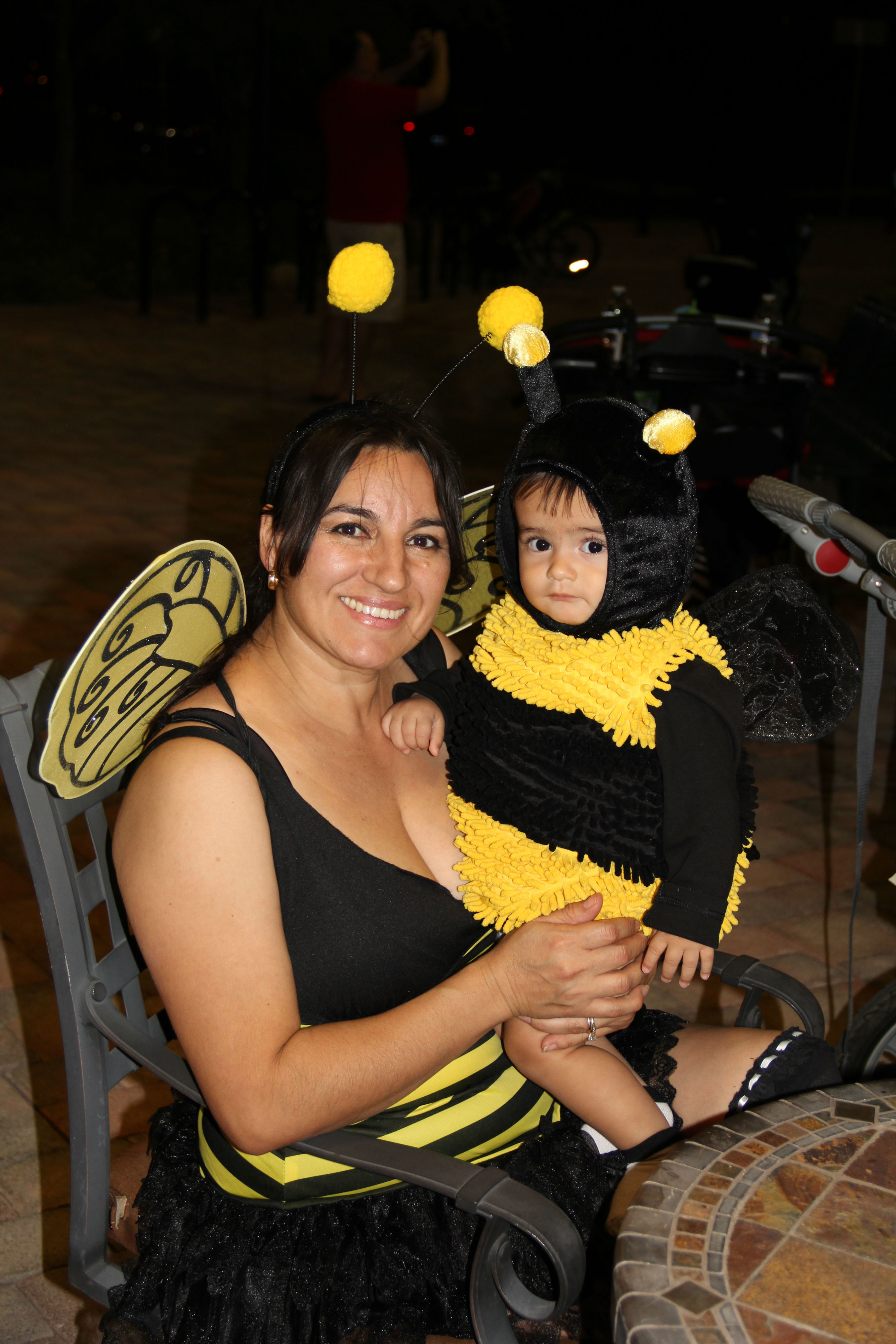 woman and baby dressed as bees