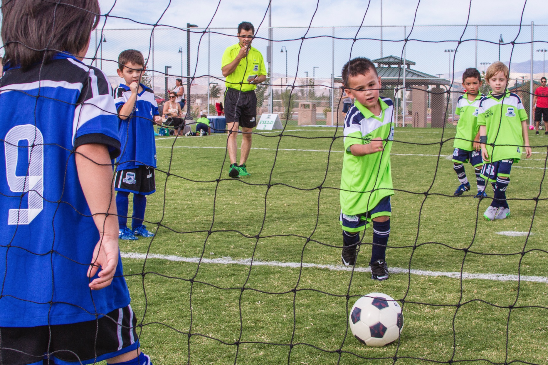 boy about to shoot soccer ball