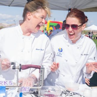 chefs laughing at farmers market