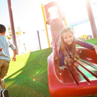 girl at end of slide