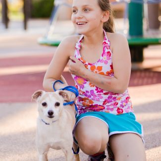 girl with dog in park