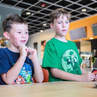 kids playing uno