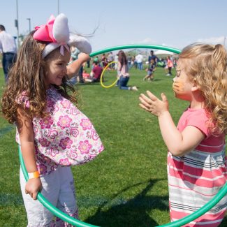 girls playing in hula hoop