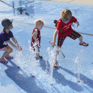 children playing in splash pad