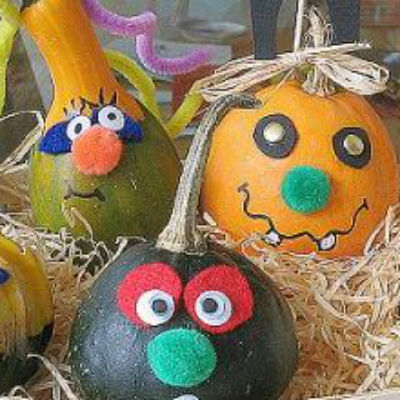 gourds painted with faces