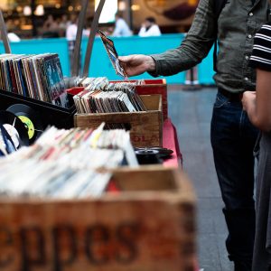 vinyl records for sale on a table