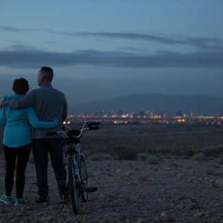 couple on nighttime bike ride
