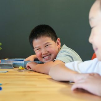 kids laughing while playing game