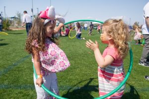 girls playing in hula hoop
