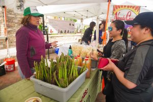 buying asparagus from a farmers market