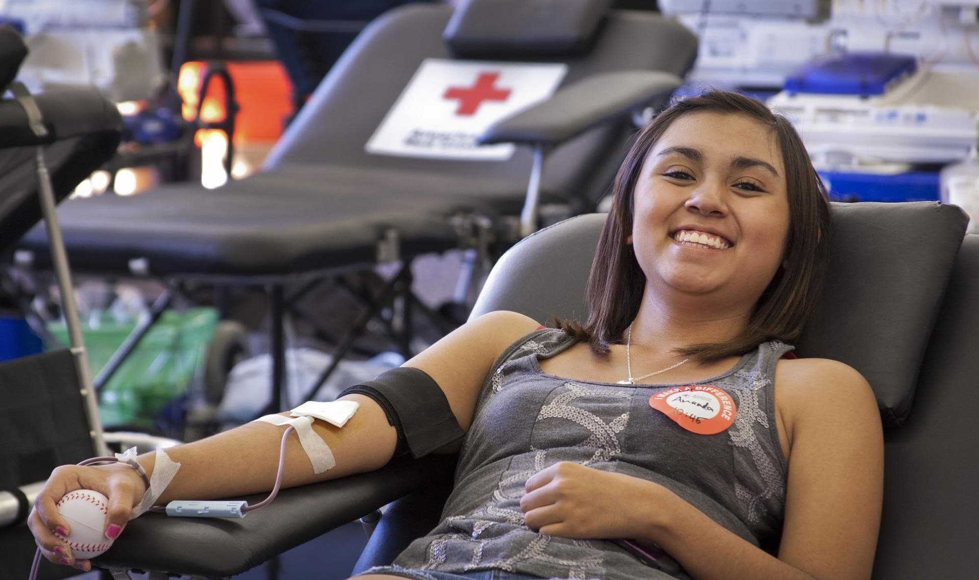 girl participating in blood drive