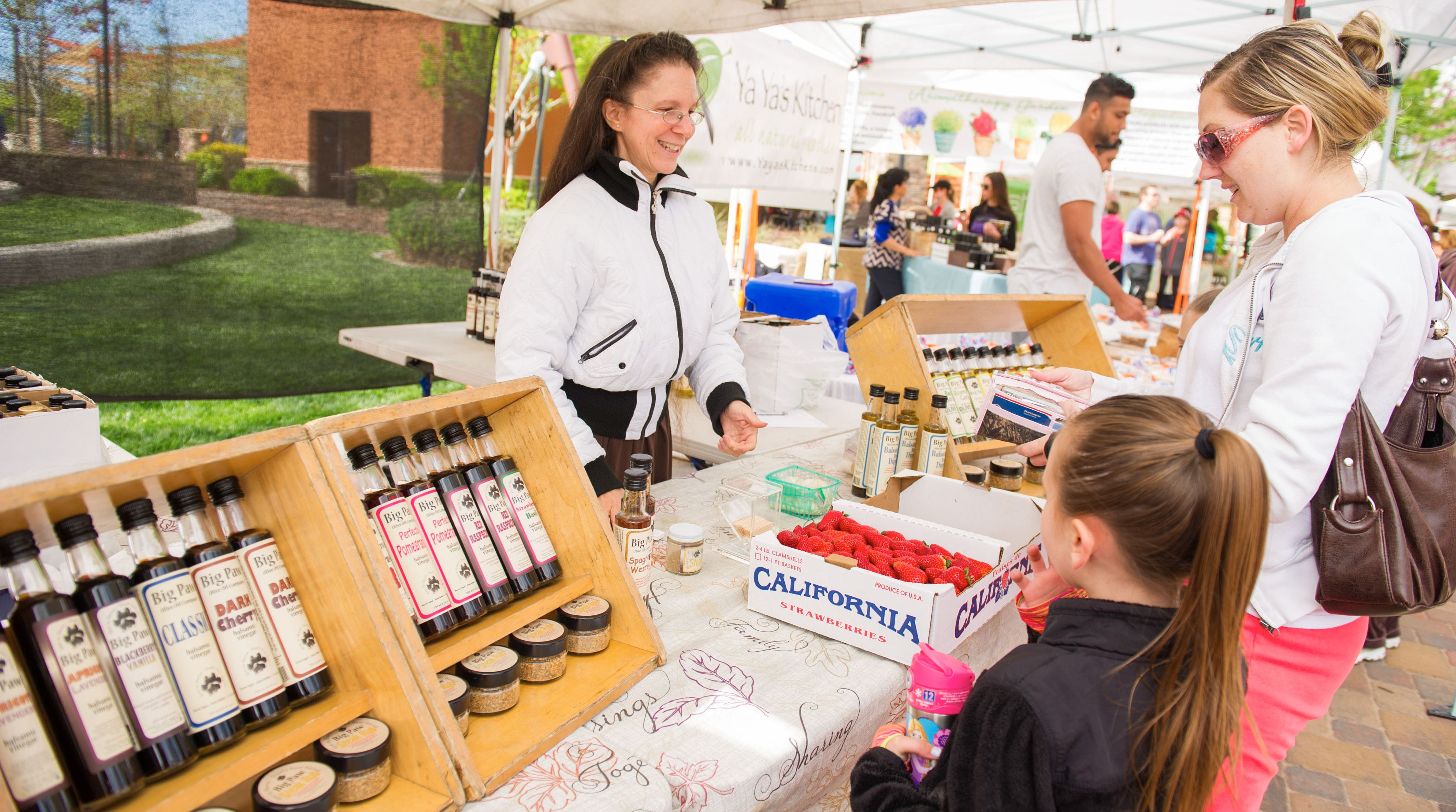 woman and daughter at farmers market