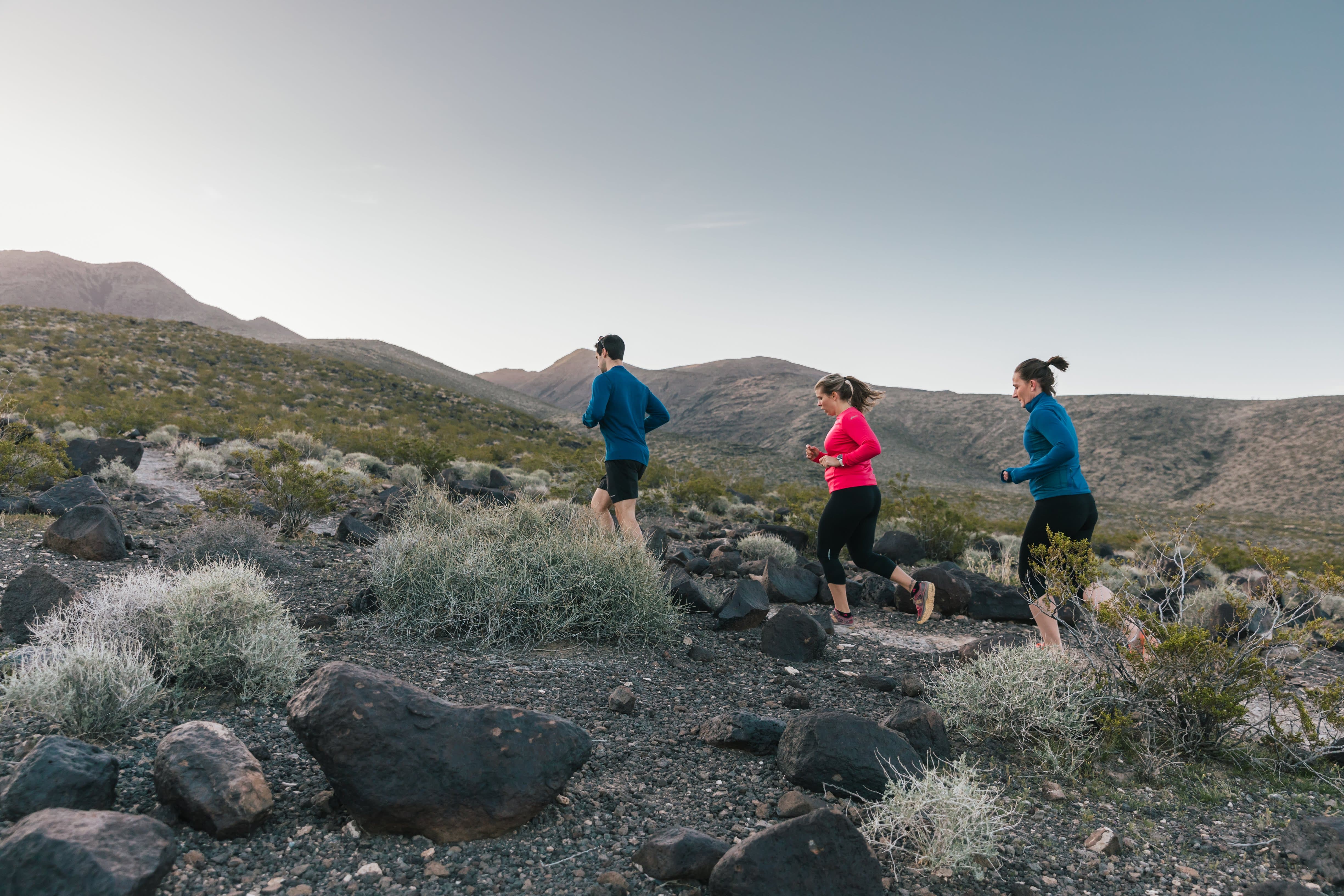 group running up mountain