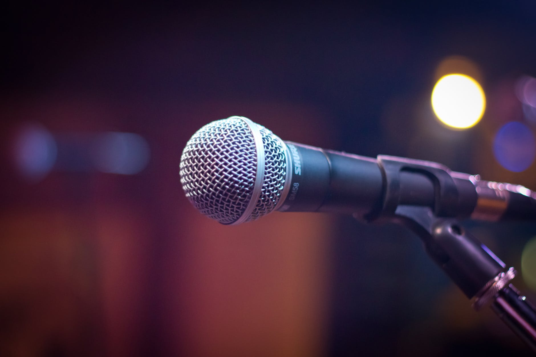 Close up of a microphone attached to a stand