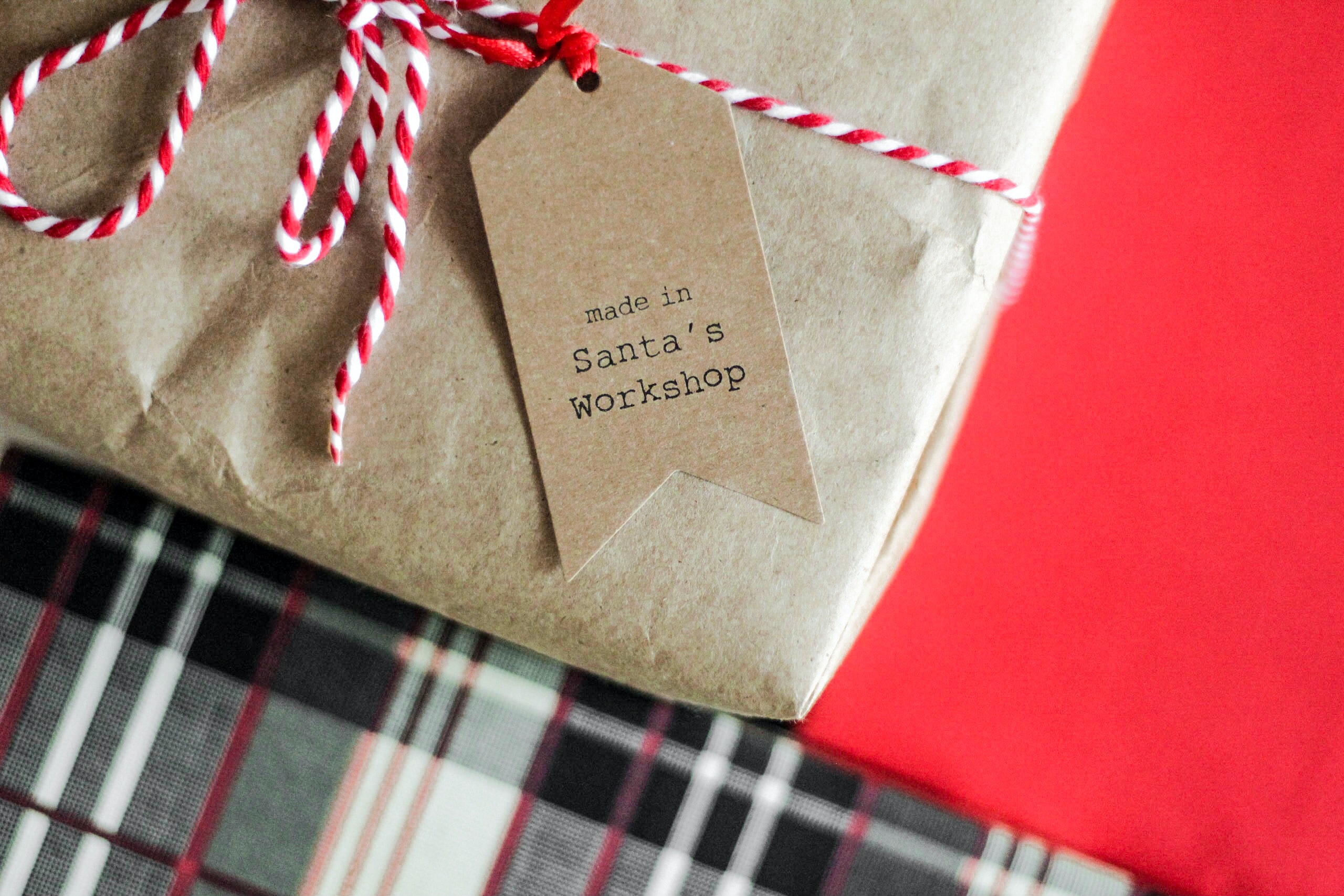 A box with a tag that says made in Santa's workshop.